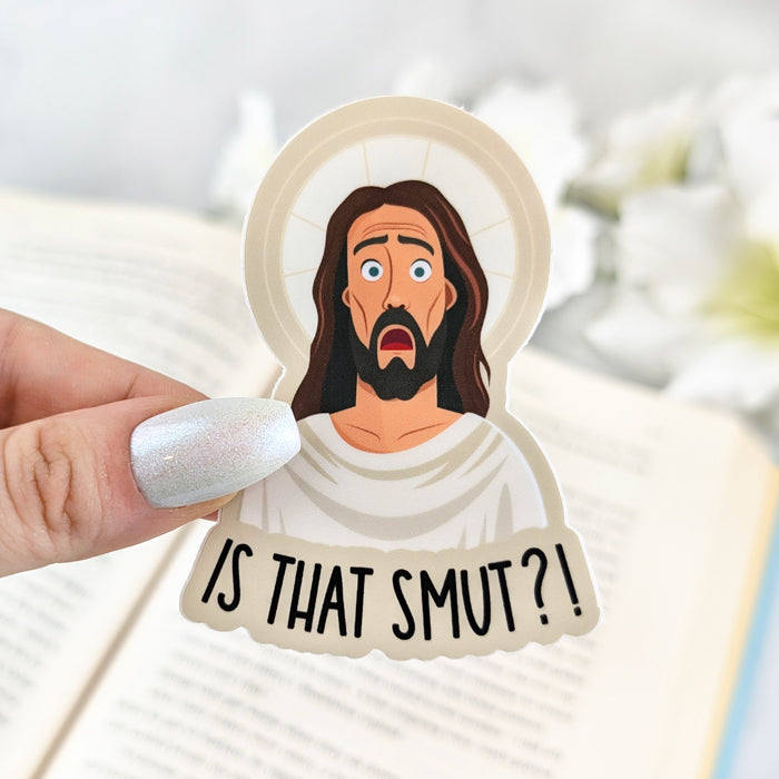 Vinyl sticker featuring cartoon
illustration of surprised Jesus with the text 'Is That Smut?!'.