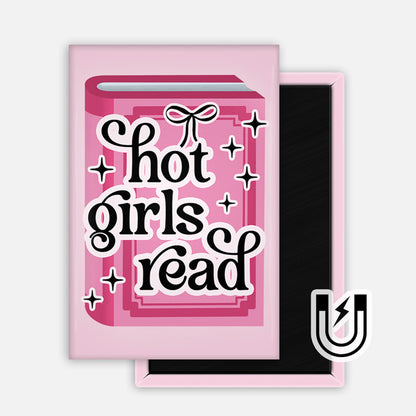 Rectangular pink magnet with a graphic of a closed book and the phrase “hot girls read” in bold black lettering surrounded by sparkles and a small bow.