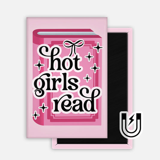 Rectangular pink magnet with a graphic of a closed book and the phrase “hot girls read” in bold black lettering surrounded by sparkles and a small bow.